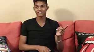 Black young man gives an interview and stimulates