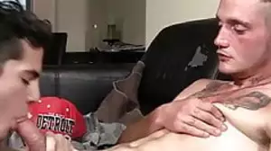 Young man sucks two cocks and receives cum close