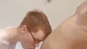 Redhead sucking on a dick in the shower