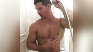 alluring boy in shower
