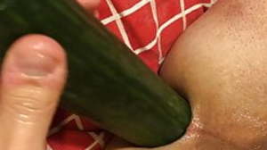 Cucumber encircling virgin ass, wish it is a real