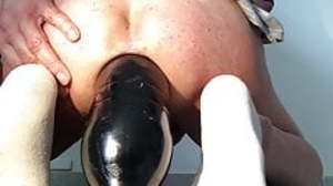 intense pleasure during a big insertion of an anal