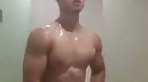 asian athlete Jo & flexing under shower