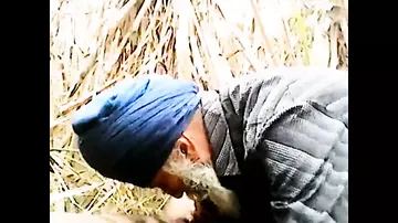 Older Indian Grandfather with facial hair takes on