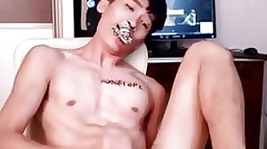 Asian boy with perfect body cums on six pack