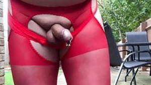 Peeing and wanking in red pantyhose tights and..