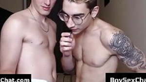 Two boys caress each other and allow for dildo on